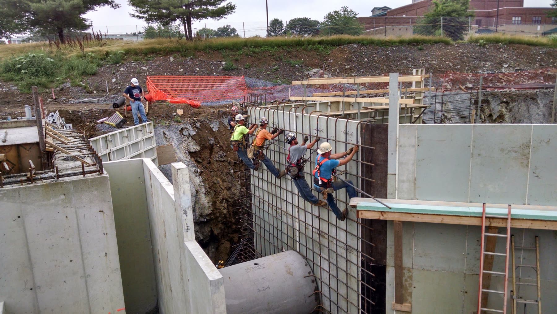 Wickersham crew tying rebar on the formed walls of the Lancaster North Sewage Pumping Station.